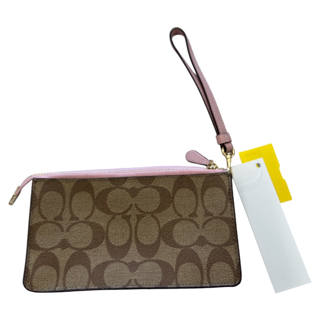 Wristlet Designer By Coach, Size: Medium